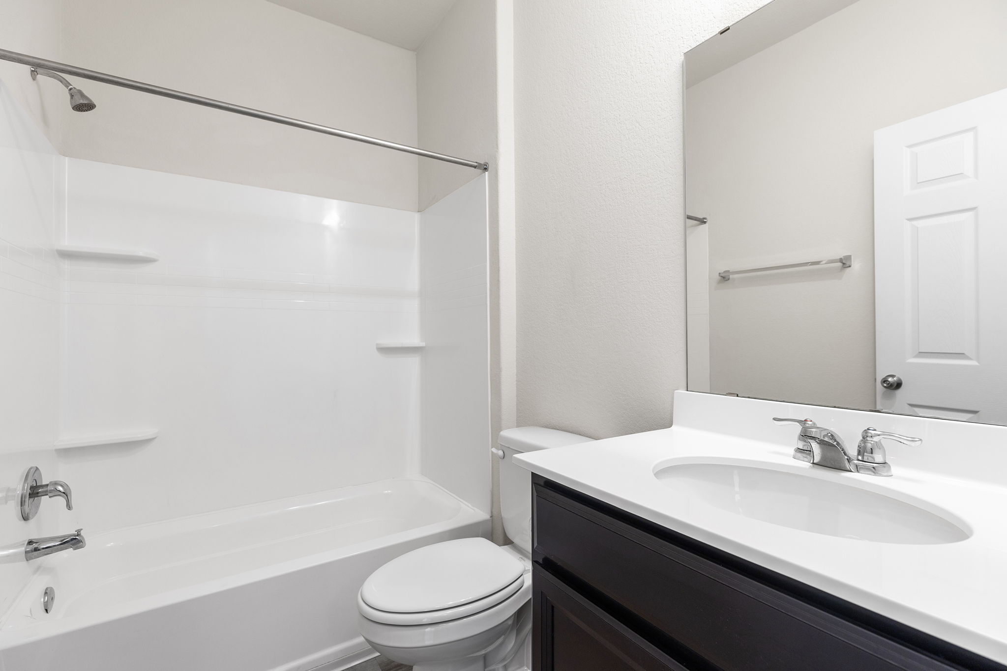 332 Spotted Rail Ridge Leander, TX 78641 - Photo 20 of 38 Main floor bathroom #2 featuring shower combination and vanity