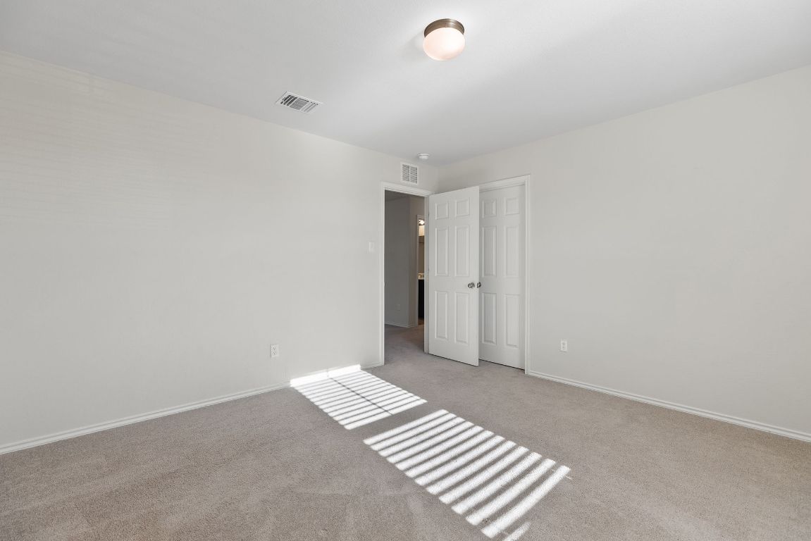 332 Spotted Rail Ridge Leander, TX 78641 - Photo 23 of 35 Bedroom #4 with carpet