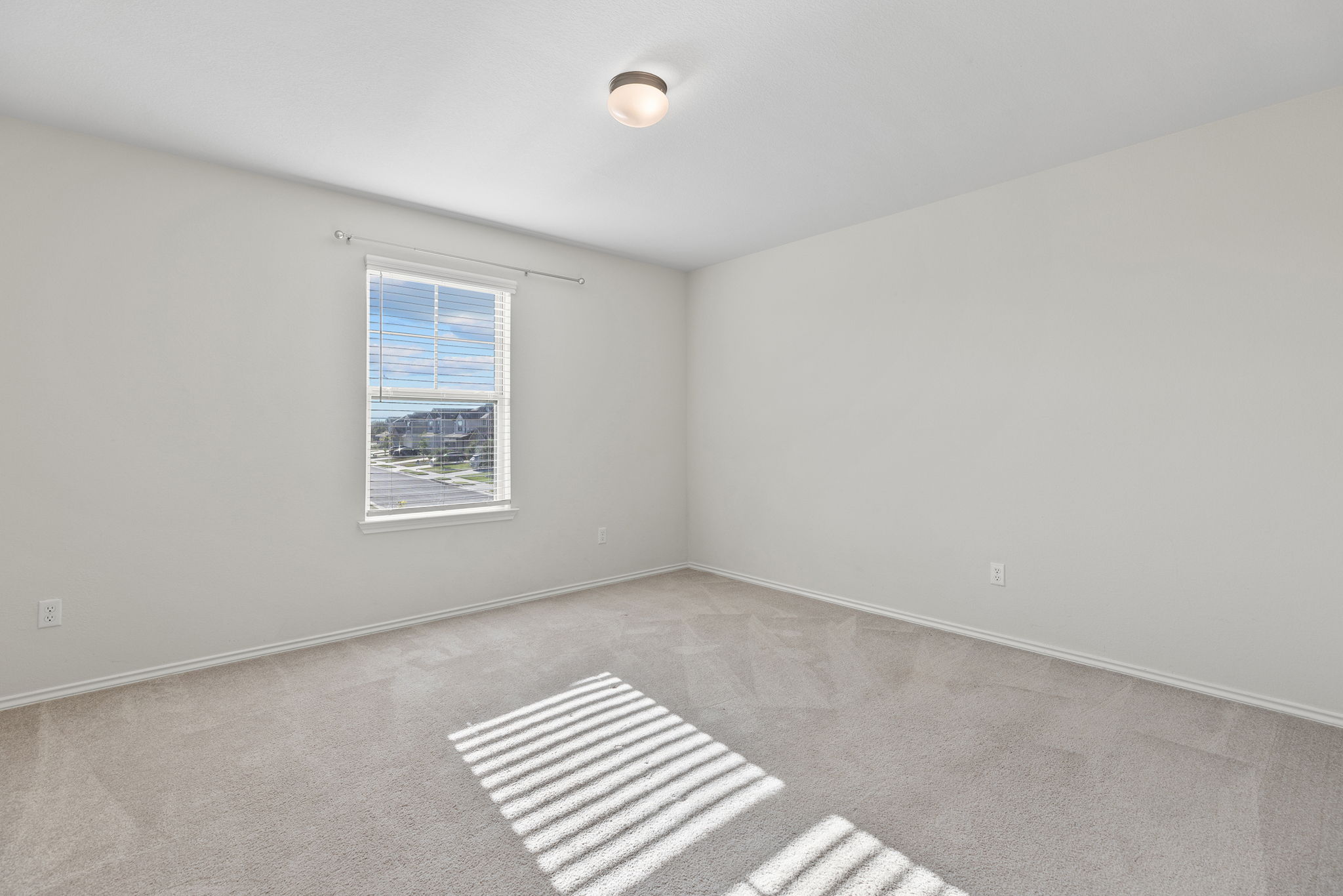 332 Spotted Rail Ridge Leander, TX 78641 - Photo 24 of 38 Bedroom #4 with light colored carpet