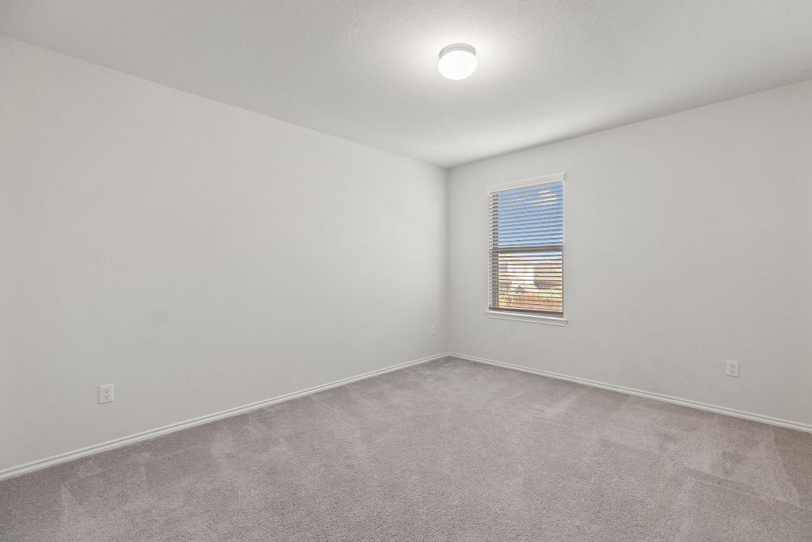 332 Spotted Rail Ridge Leander, TX 78641 - Photo 27 of 35 Bedroom #6 with carpet floors