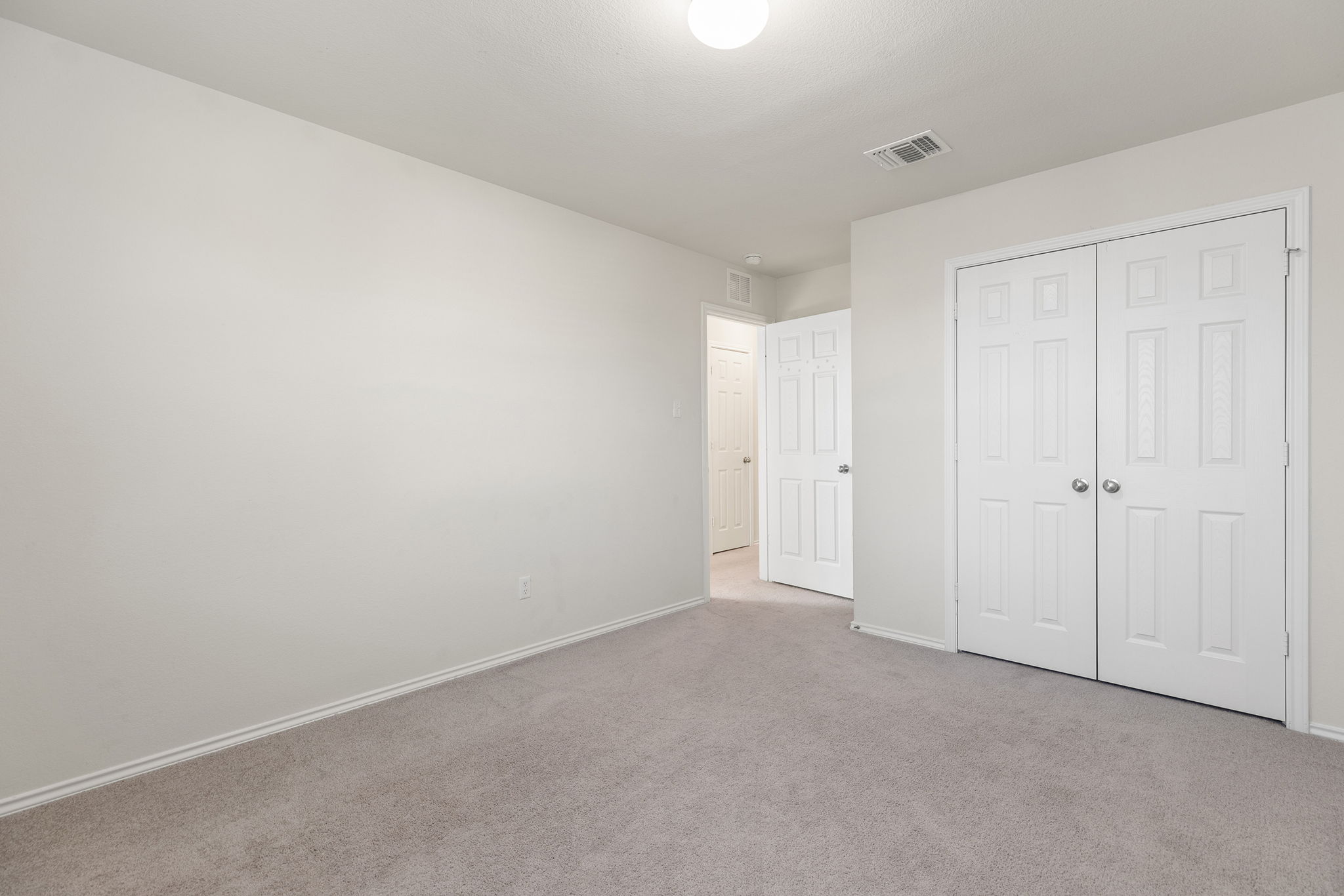 332 Spotted Rail Ridge Leander, TX 78641 - Photo 30 of 38 Bedroom #6 with carpet and a closet