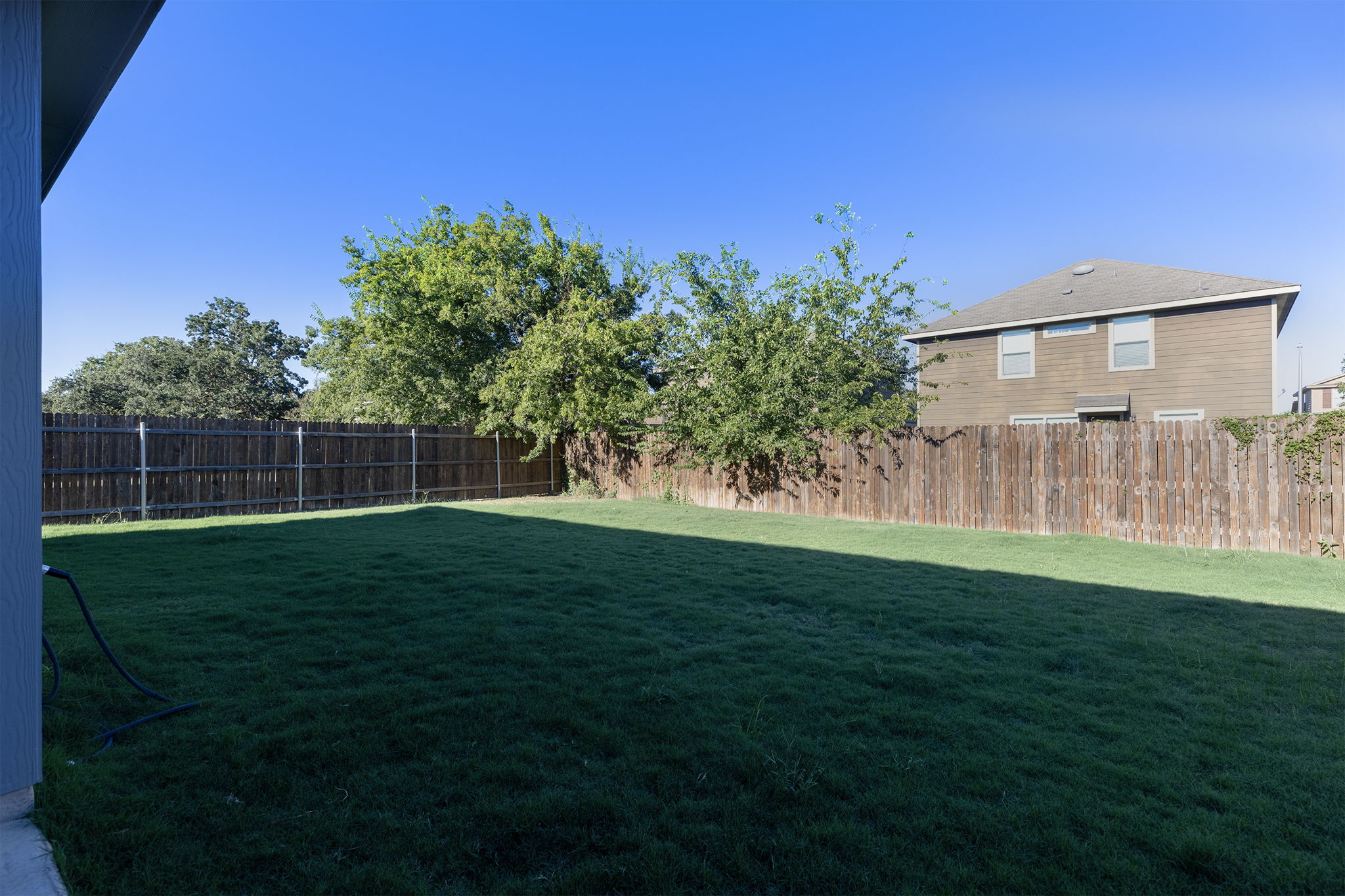 332 Spotted Rail Ridge Leander, TX 78641 - Photo 32 of 38 View of fenced backyard