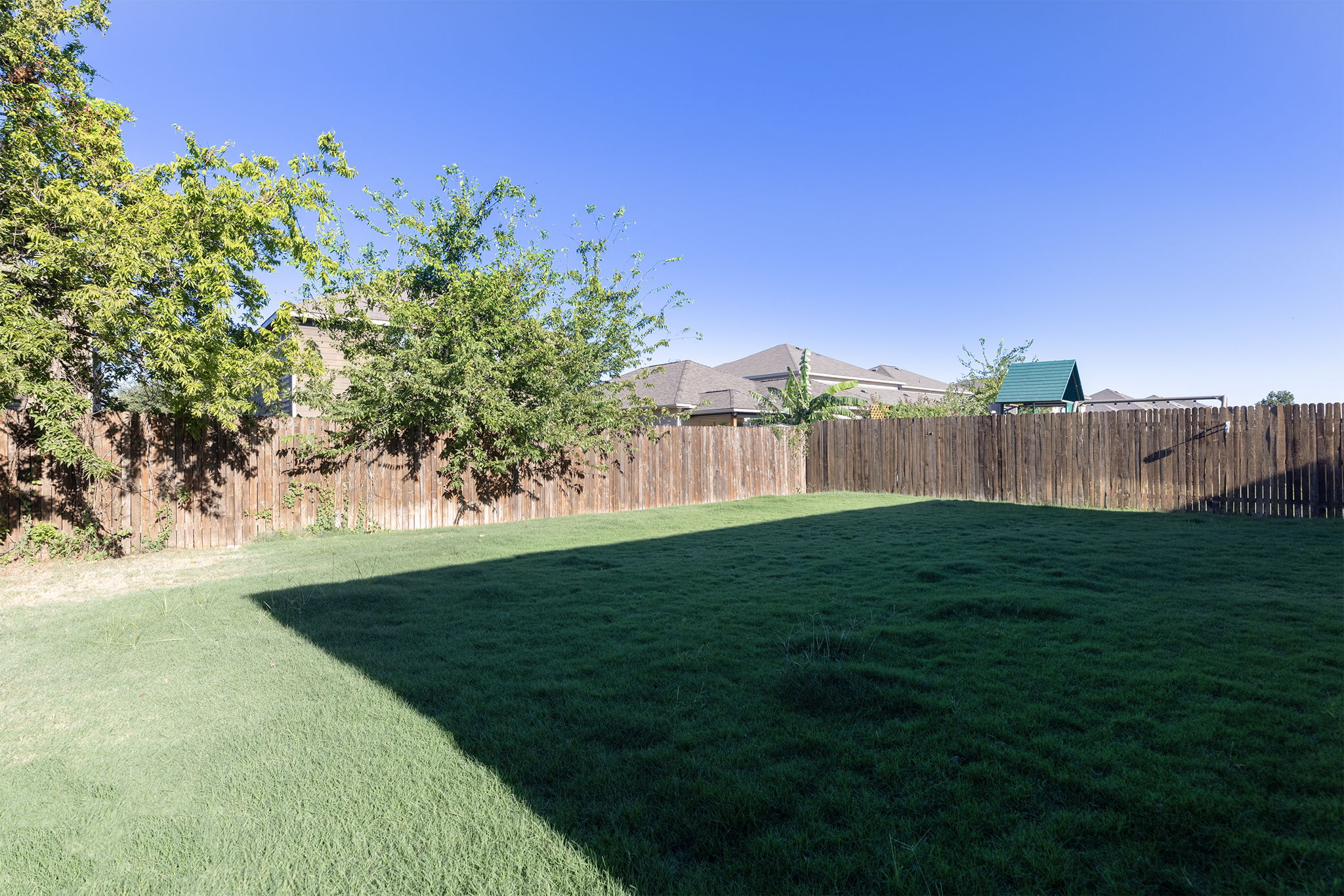 332 Spotted Rail Ridge Leander, TX 78641 - Photo 33 of 38 View of fenced backyard