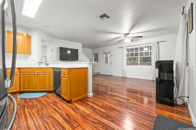 a view of a living room with a flat screen tv