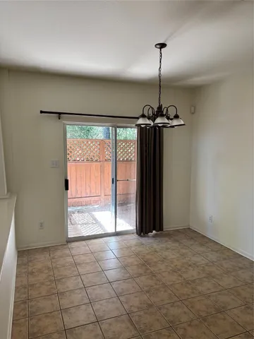 a view of a room with a large window