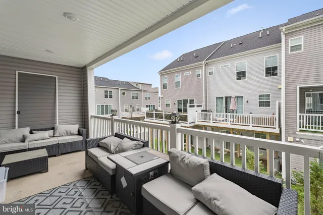 a balcony with furniture
