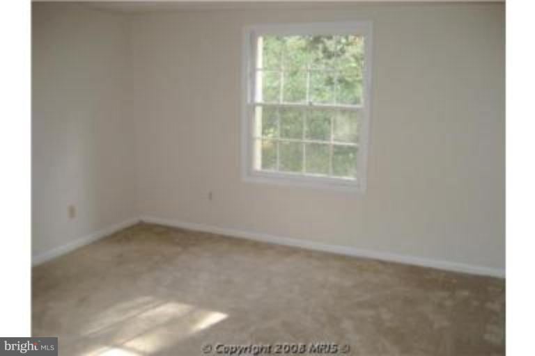 8110 Colony Point Road, Unit 219 Springfield, VA 22152 - Photo 7 of 8 Master Bedroom