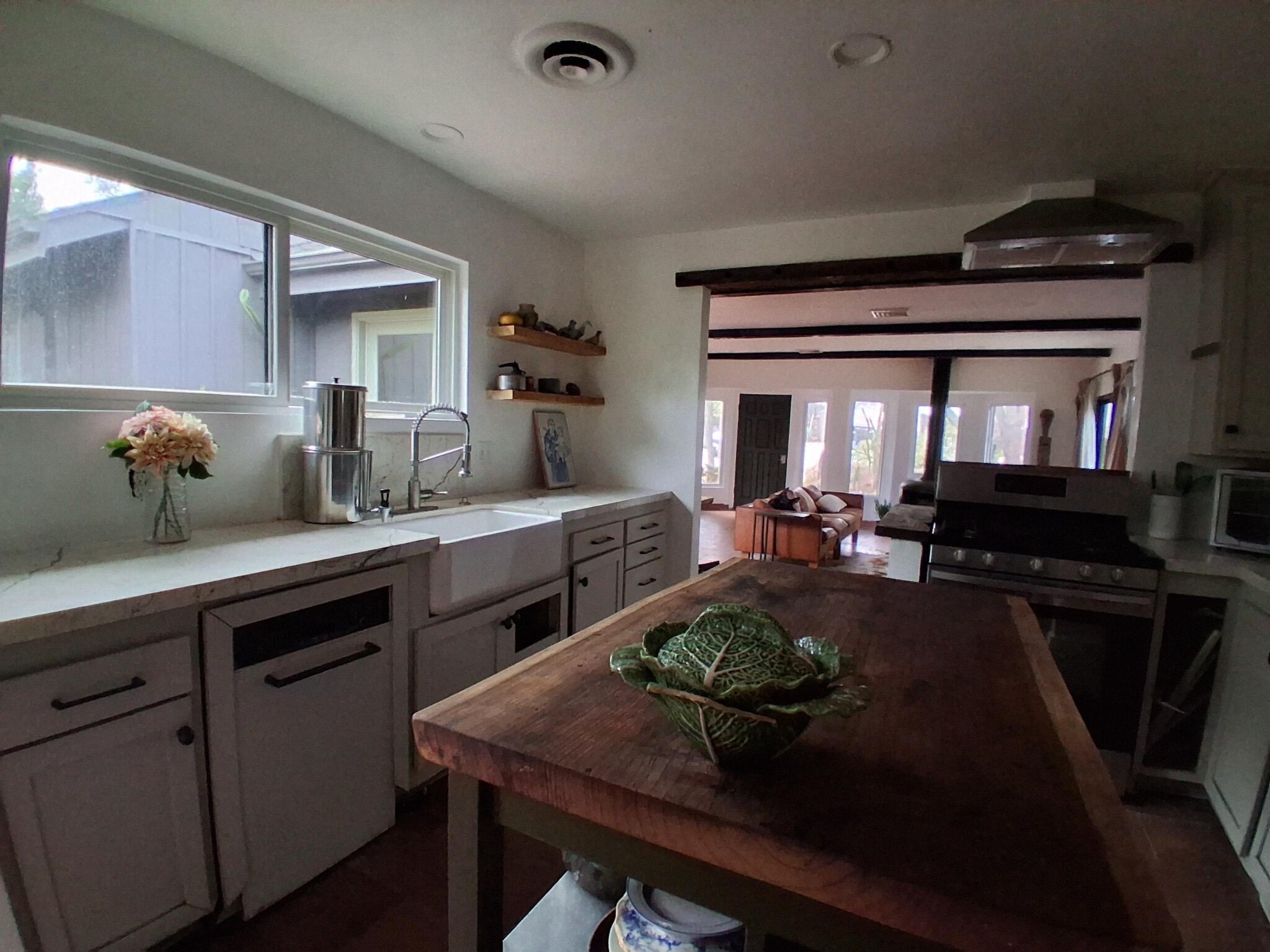 1794 South Rice Road Ojai, CA 93023 - Photo 15 of 33 a kitchen with sink table and chairs