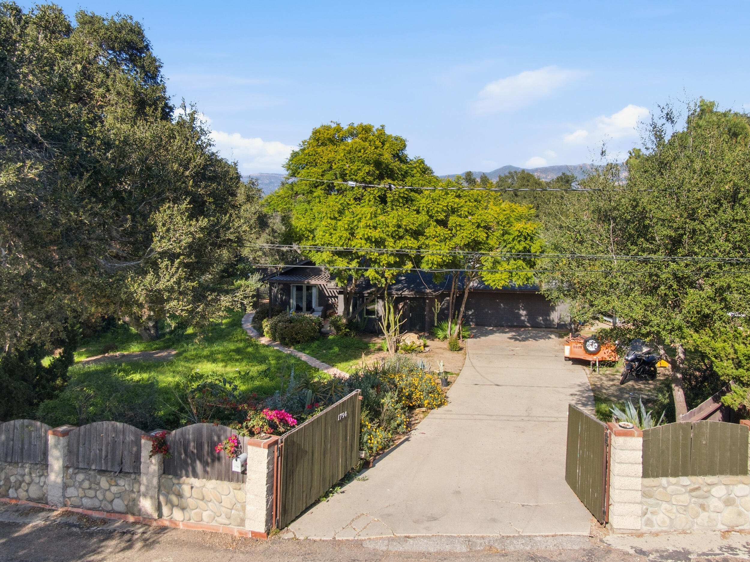 1794 South Rice Road Ojai, CA 93023 - Photo 30 of 33 a view of a park with potted plants and large trees