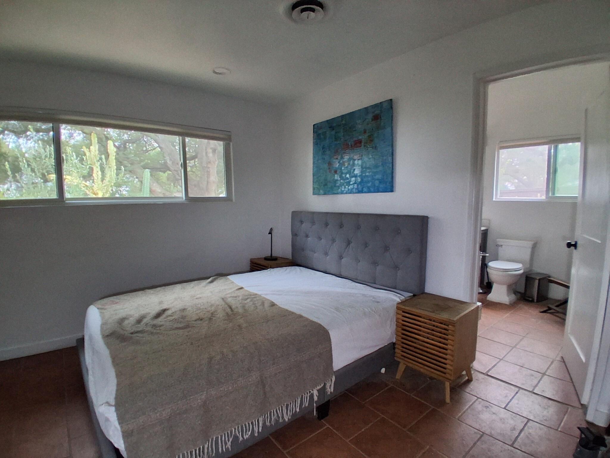 1794 South Rice Road Ojai, CA 93023 - Photo 9 of 33 a bedroom with a bed and a couch