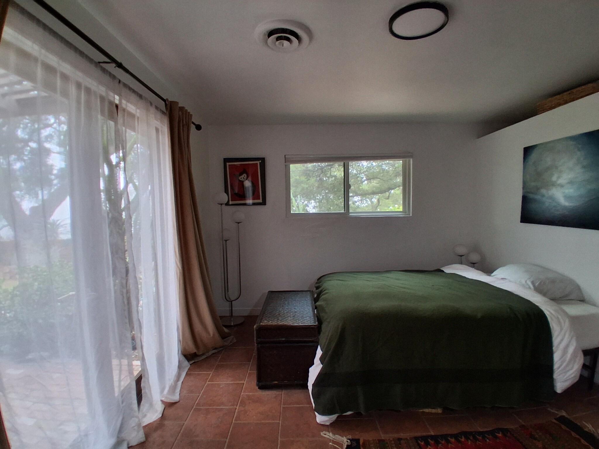 1794 South Rice Road Ojai, CA 93023 - Photo 10 of 33 a bedroom with a bed and window