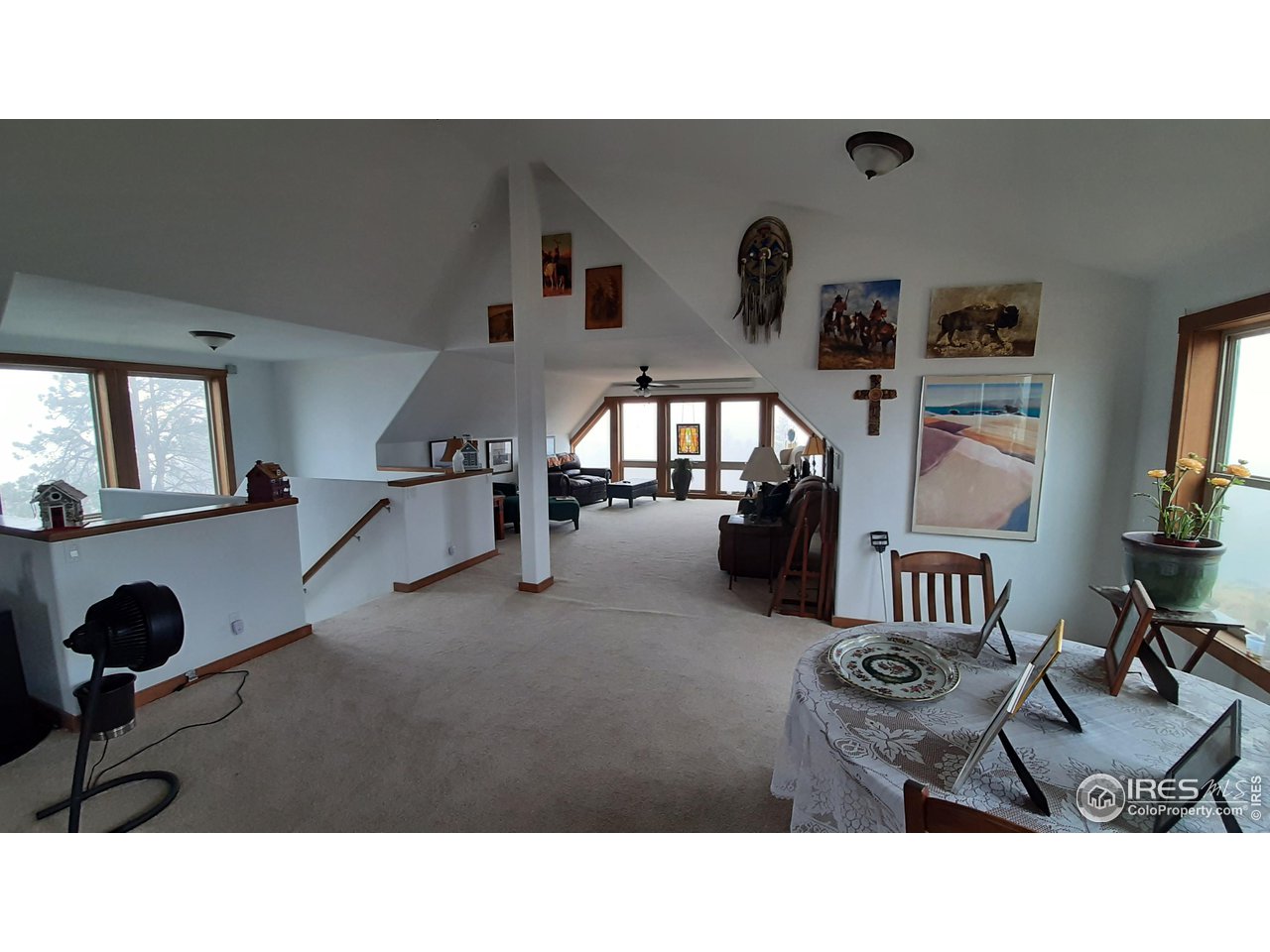 2865 Davis Ranch Road Bellvue, CO 80512 - Photo 21 of 38 a living room with furniture and a flat screen tv