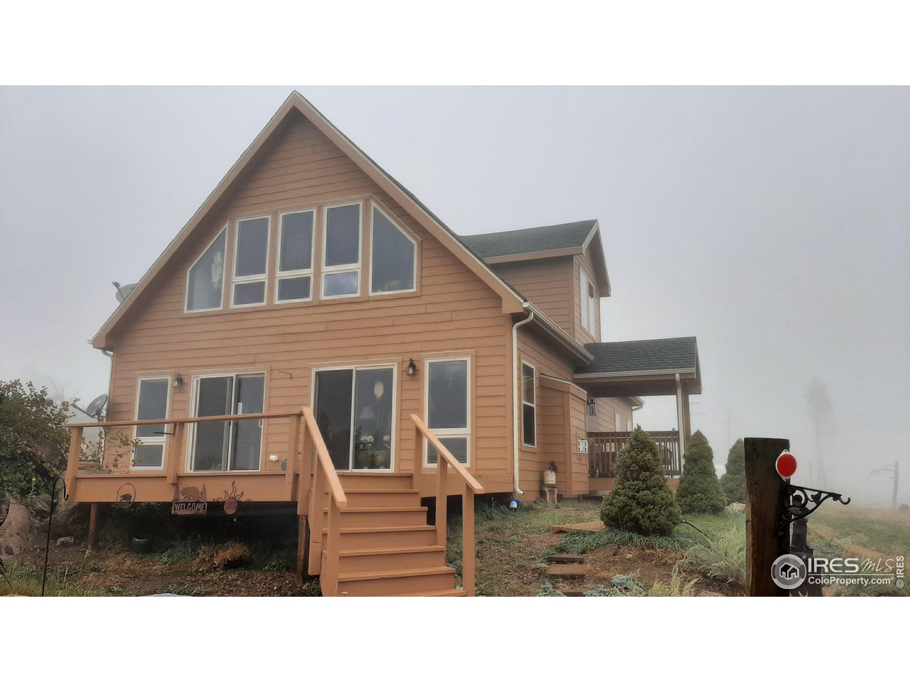 2865 Davis Ranch Road Bellvue, CO 80512 - Photo 31 of 38 a house view with a outdoor space