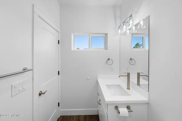 a bathroom with a toilet and a bathtub