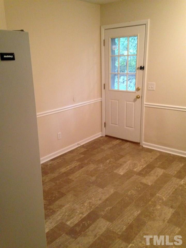 1108 Terrace Court Raleigh, NC 27615 - Photo 8 of 24 an empty room with windows