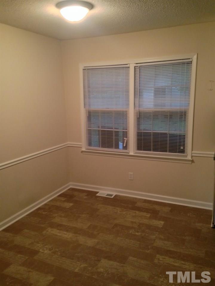 1108 Terrace Court Raleigh, NC 27615 - Photo 9 of 24 a view of empty room with window