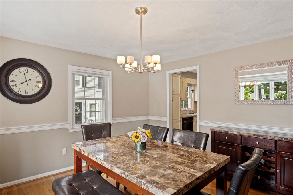 20 Casey Circle, Unit 20 Waltham, MA 02451 - Photo 14 of 38 a view of a dining room with furniture and chandelier