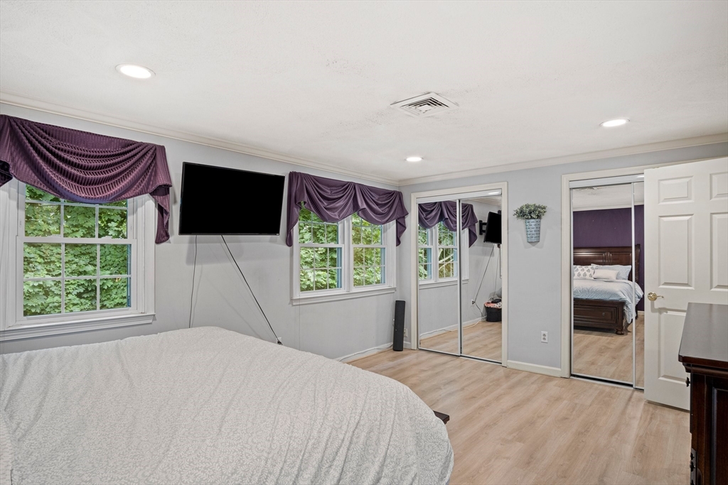 20 Casey Circle, Unit 20 Waltham, MA 02451 - Photo 17 of 38 a bedroom with a bed and a window