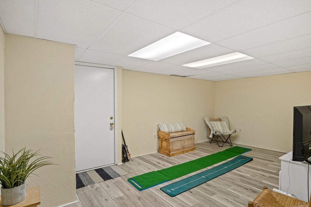 20 Casey Circle, Unit 20 Waltham, MA 02451 - Photo 23 of 38 a living room with furniture and a flat screen tv