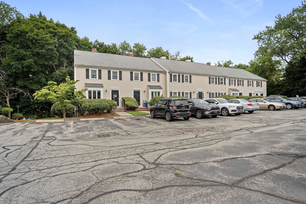 20 Casey Circle, Unit 20 Waltham, MA 02451 - Photo 30 of 38 a front view of residential houses with yard