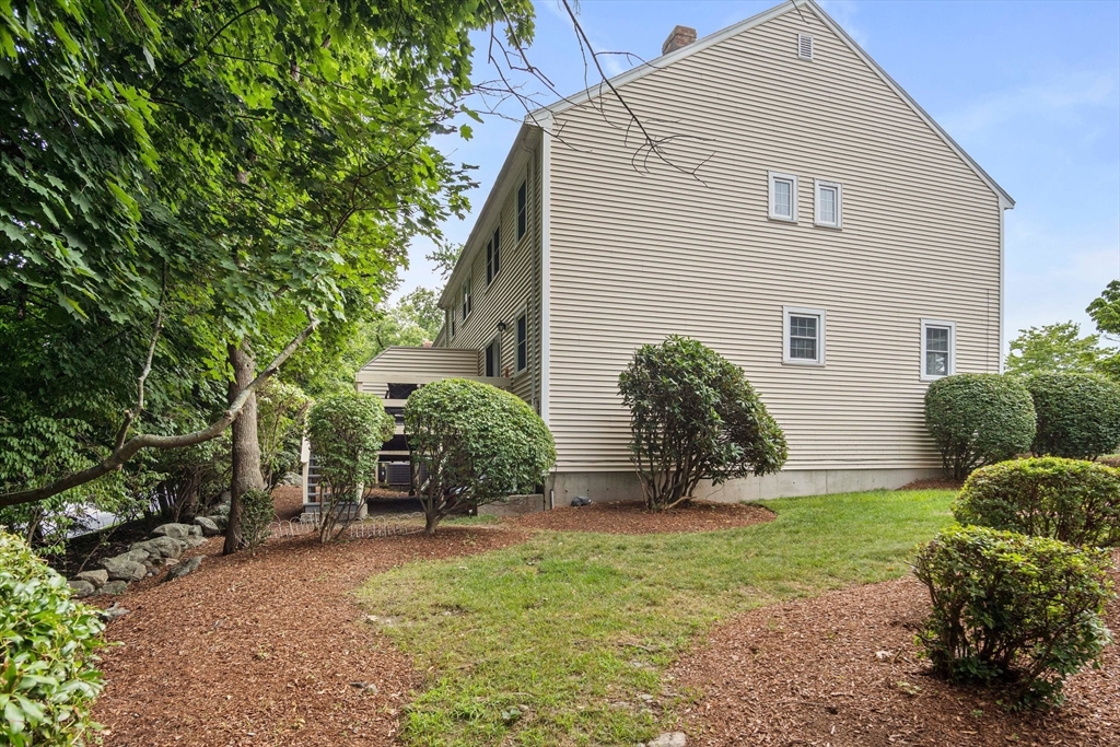 20 Casey Circle, Unit 20 Waltham, MA 02451 - Photo 32 of 38 a view of a back yard of the house