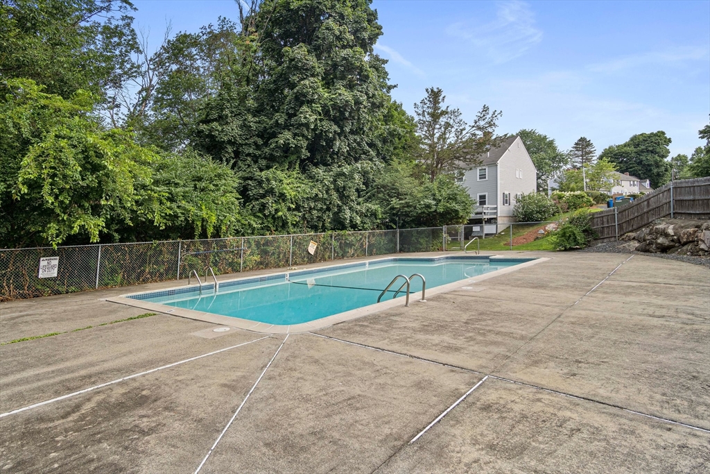 20 Casey Circle, Unit 20 Waltham, MA 02451 - Photo 33 of 38 a view of outdoor space and tennis court