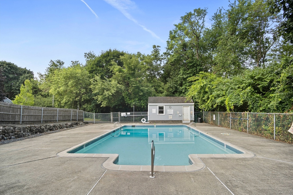 20 Casey Circle, Unit 20 Waltham, MA 02451 - Photo 34 of 38 a view of a swimming pool with a patio