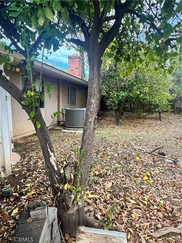a view of a street with a building in the background