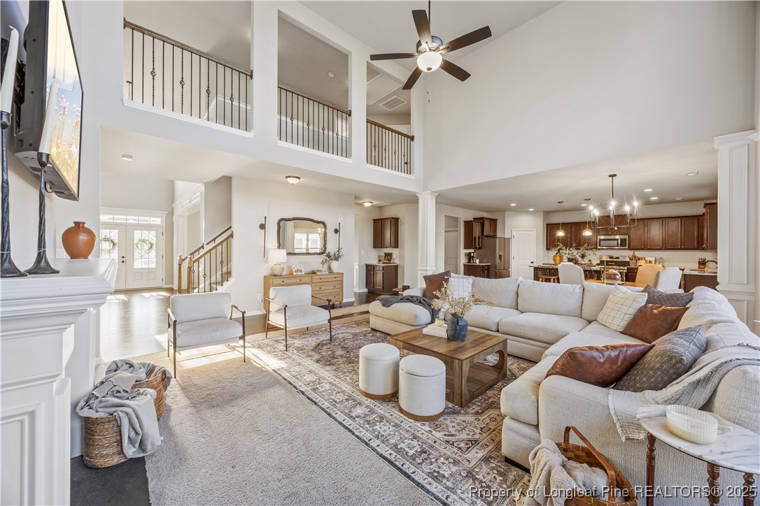 1709 Eagle Hill Road Fayetteville, NC 28312 - Photo 14 of 46 a living room with furniture a rug and white walls