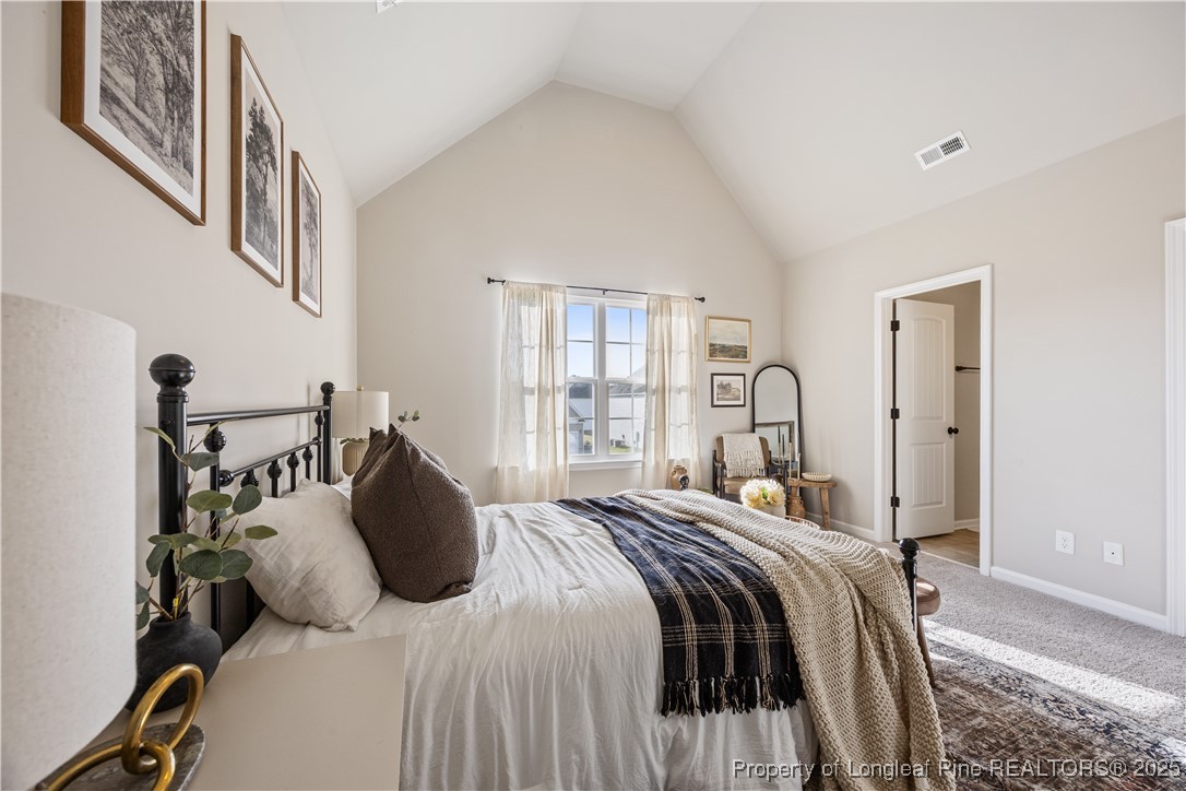 1709 Eagle Hill Road Fayetteville, NC 28312 - Photo 25 of 46 a bedroom with a bed and a window