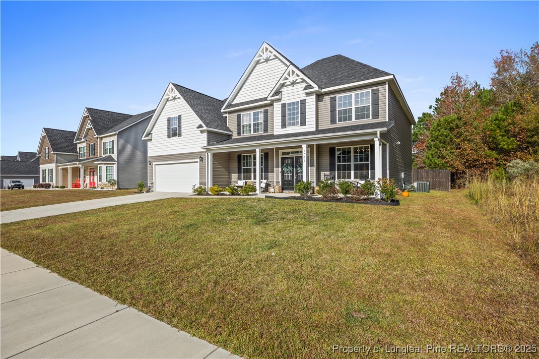 1709 Eagle Hill Road Fayetteville, NC 28312 - Photo 3 of 46 a front view of a house with garden