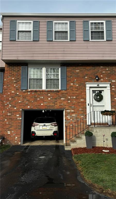 4 B Springwood Square Harwick, PA 15049 - Photo 31 of 32 front view of a brick house with a yard