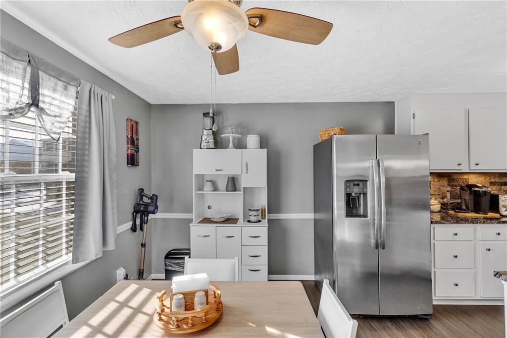 4 B Springwood Square Harwick, PA 15049 - Photo 6 of 32 a kitchen with stainless steel appliances a refrigerator and a stove
