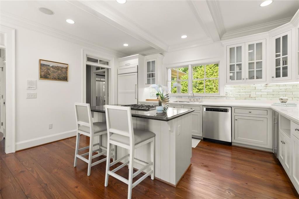 1450 Acworth Due West Road Northwest Kennesaw, GA 30152 - Photo 18 of 77 a kitchen with a sink cabinets and wooden floor