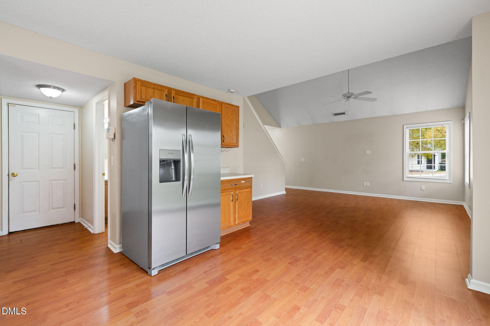 4701 Tommans Trail Raleigh, NC 27616 - Photo 24 of 36 a kitchen with stainless steel appliances a refrigerator and a stove top oven