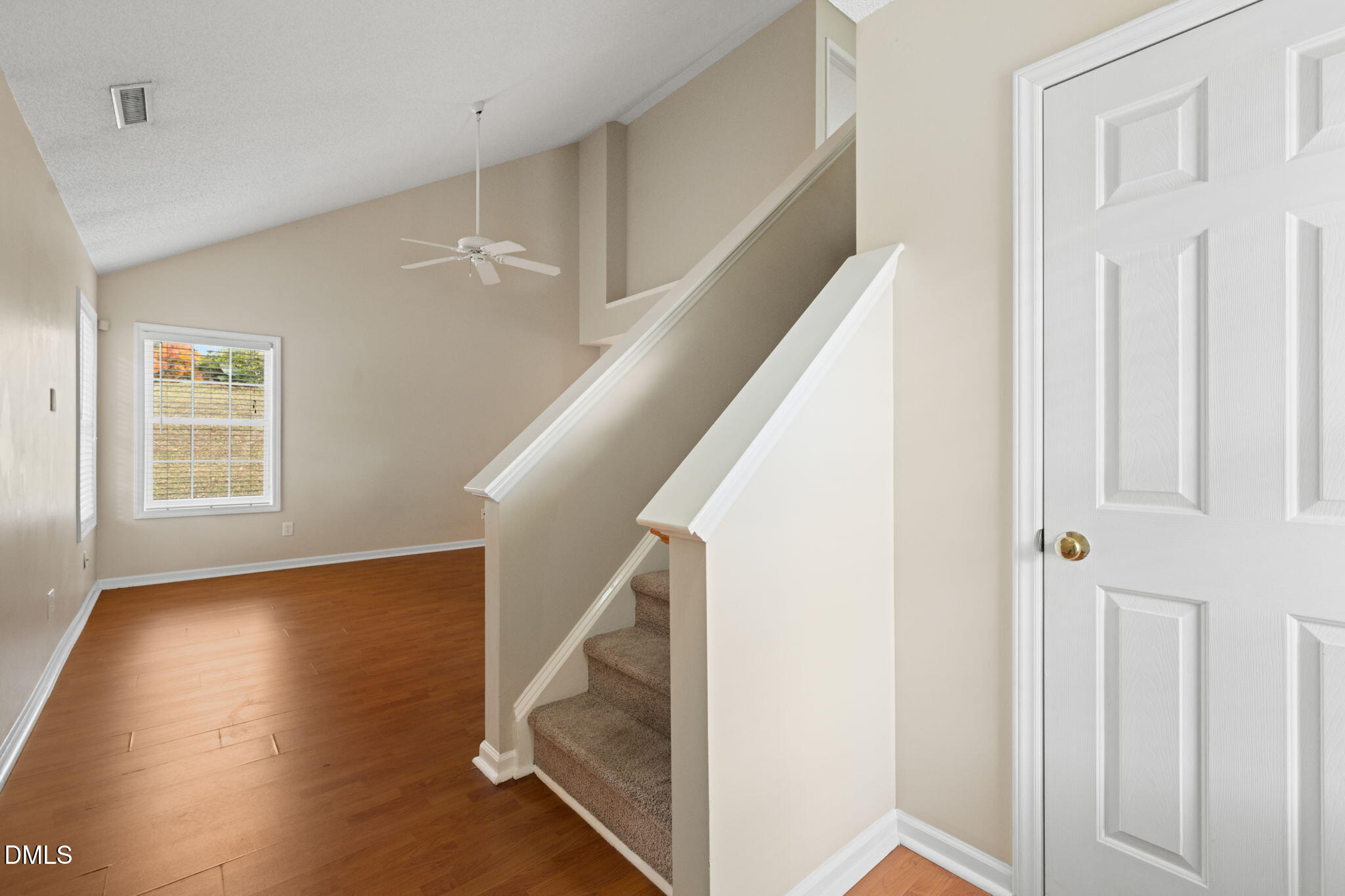 4701 Tommans Trail Raleigh, NC 27616 - Photo 31 of 36 a view of entryway and hall with wooden floor