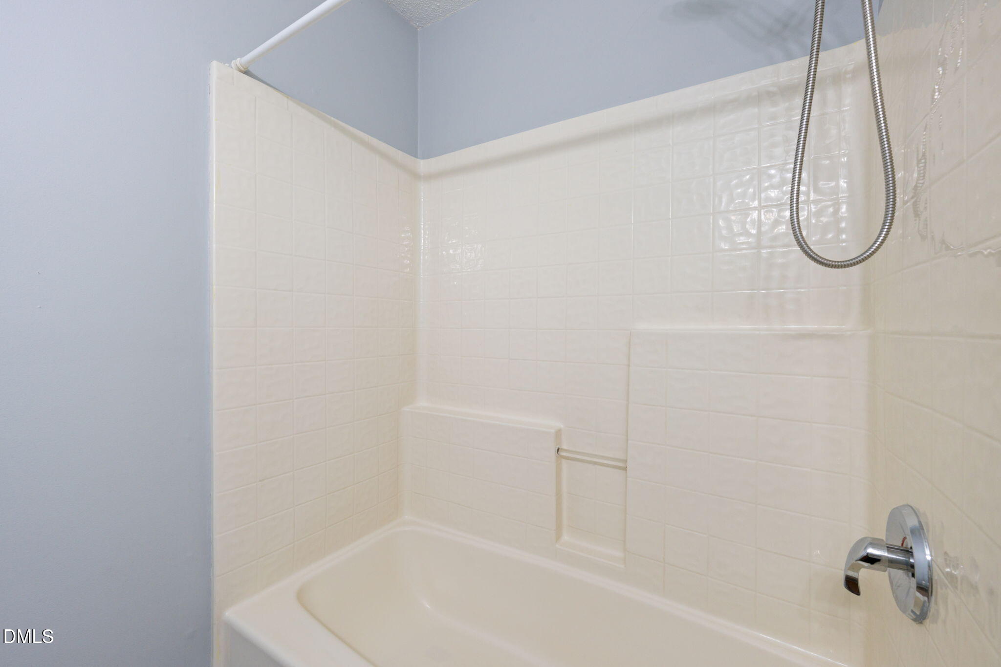 4701 Tommans Trail Raleigh, NC 27616 - Photo 9 of 36 a bathroom with a bath tub and a shower
