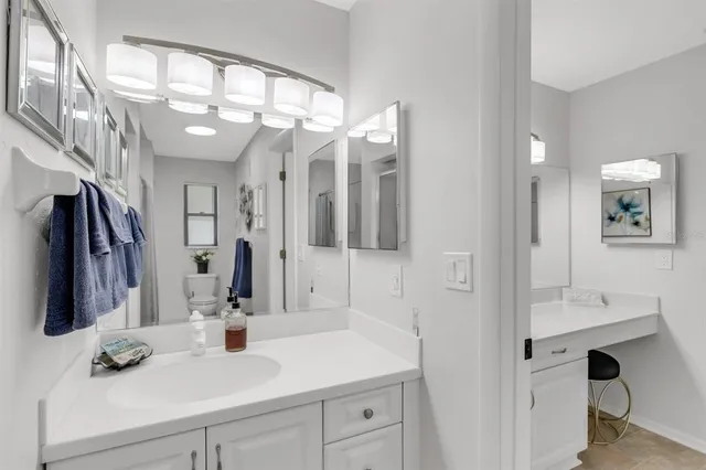 swimming pool view with a garden space