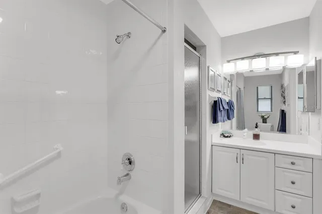 a view of a swimming pool with a lounge chairs