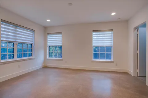 an empty room with windows