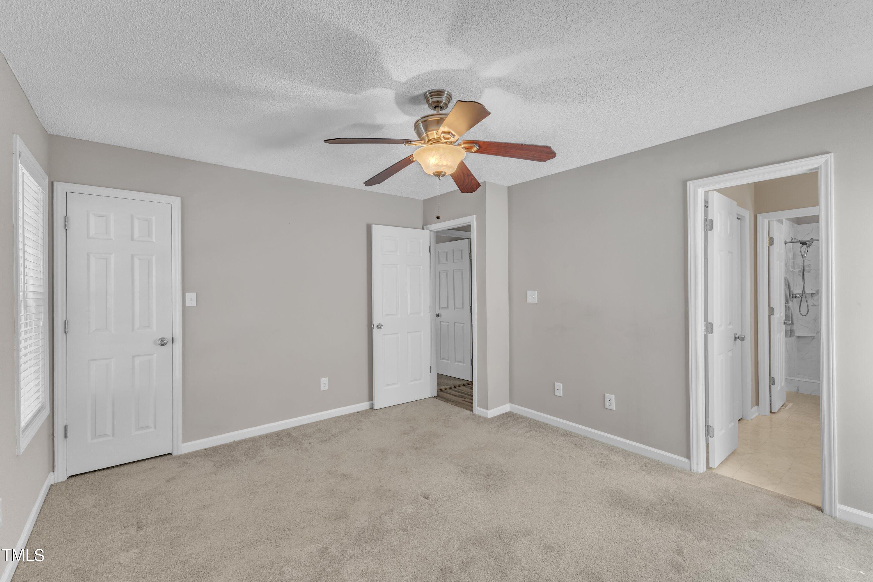 4533 Whistling Way Raleigh, NC 27616 - Photo 19 of 25 Another view of Owners Suite with entry into bathroom visible
