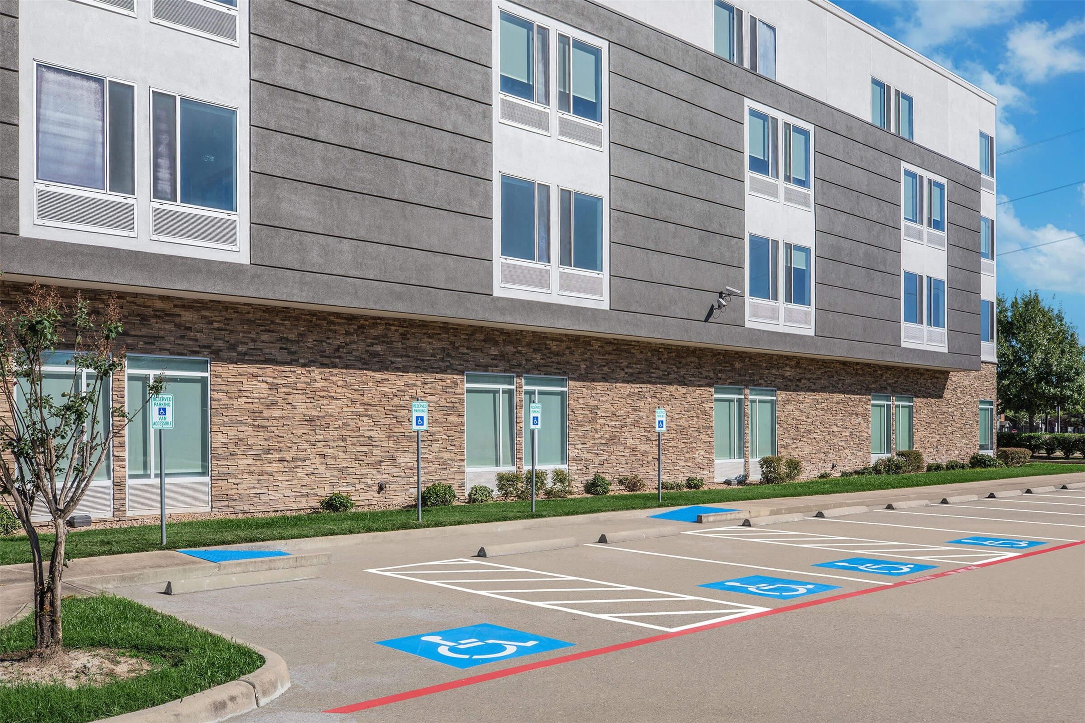 1350 Broadfield Boulevard, Unit 228 Houston, TX 77084 - Photo 26 of 29 a front view of a building with a road