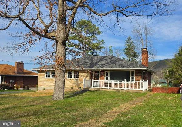 a view of a house with a garden