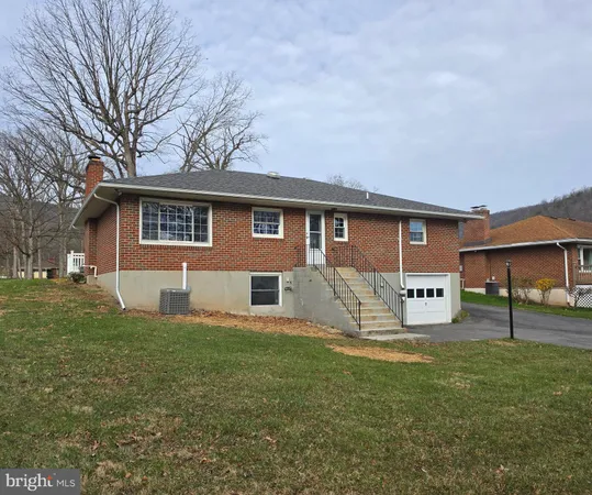 a house view with a garden space
