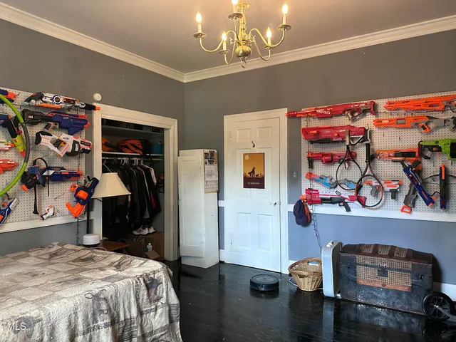 a bedroom with a bed and a bed