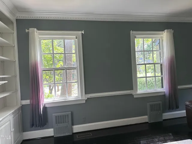 a view of a room that has a window in it
