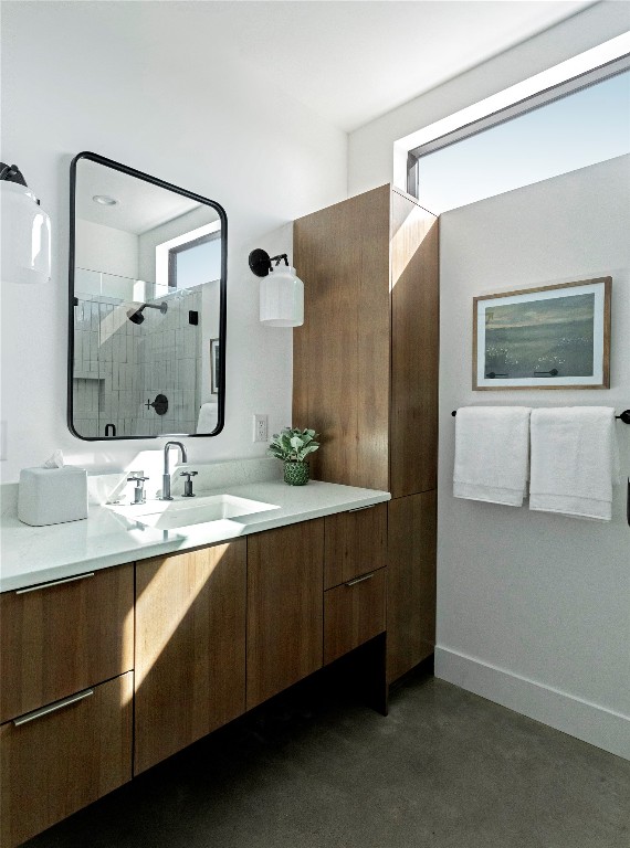 9361 Highway 290, Unit 118 Hye, TX 78635 - Photo 26 of 38 a bathroom with a double vanity sink and mirror