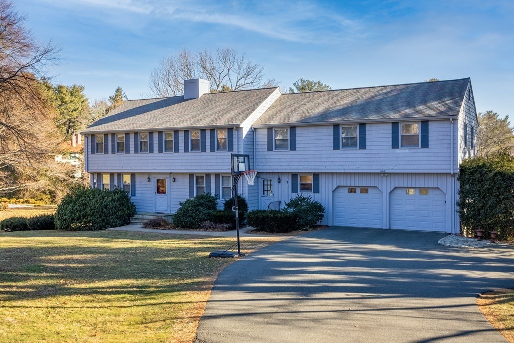 1140 Webster Street Needham, MA 02492 - Photo 1 of 27 a view of a house with a swimming pool