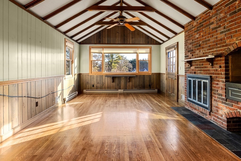 1140 Webster Street Needham, MA 02492 - Photo 11 of 27 a view of an empty room with wooden floor and windows