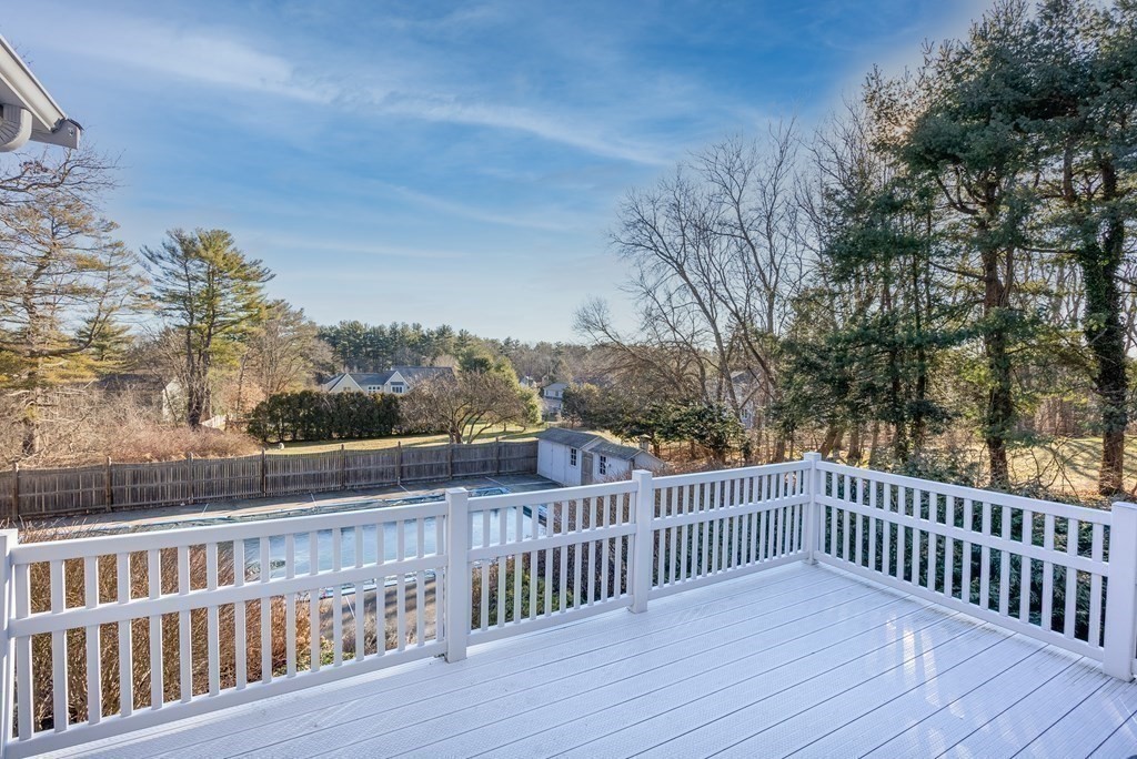 1140 Webster Street Needham, MA 02492 - Photo 13 of 27 a view of deck with wooden fence and trees